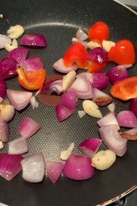 fried red onion, garlic and red bell pepper