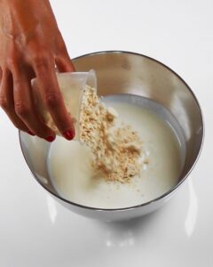 vegan protein powder in a bowl of plant-based yogurt